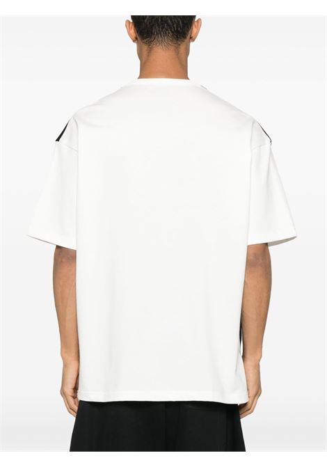 T-shirt con design a strati in bianco e nero Comme des Garçons Homme - uomo COMME DES GARCONS HOMME | HOT0062